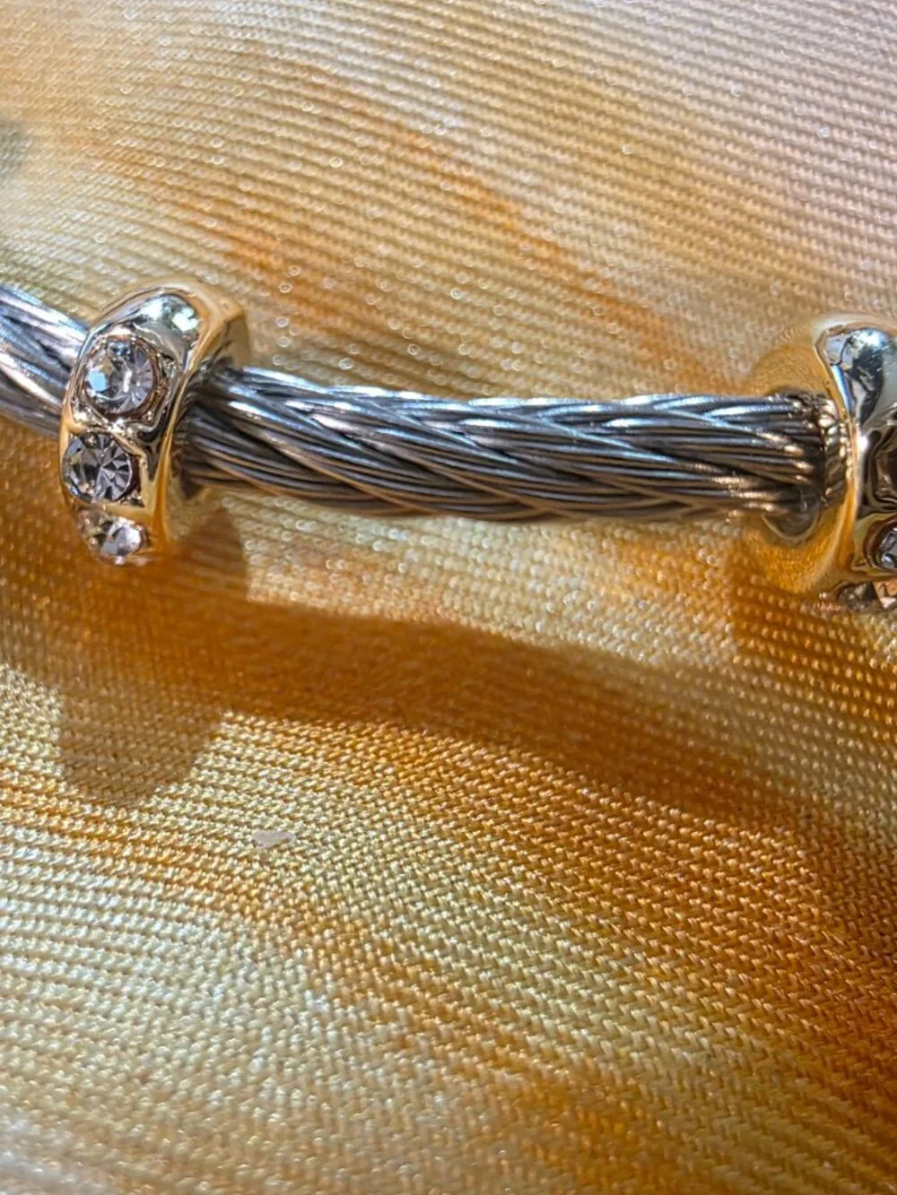 Frieda Rothman-2 tone silver wire and gold overlay cubic zirconia bracelt